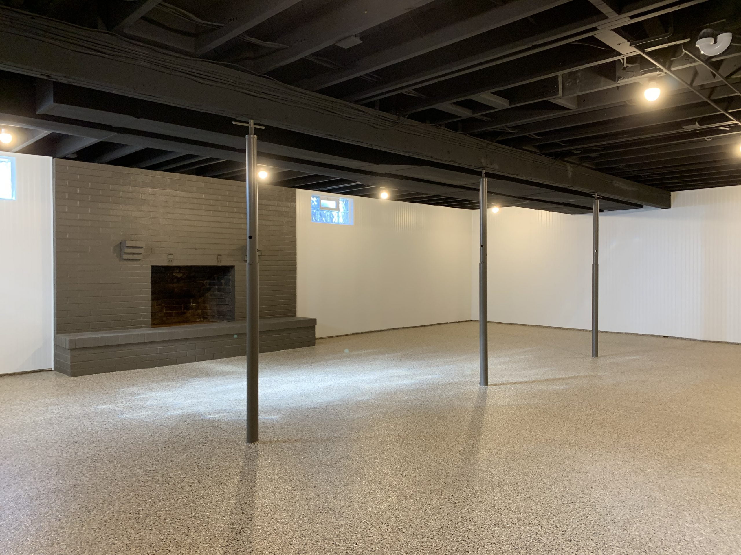 Restored Basement and basement epoxy flooring