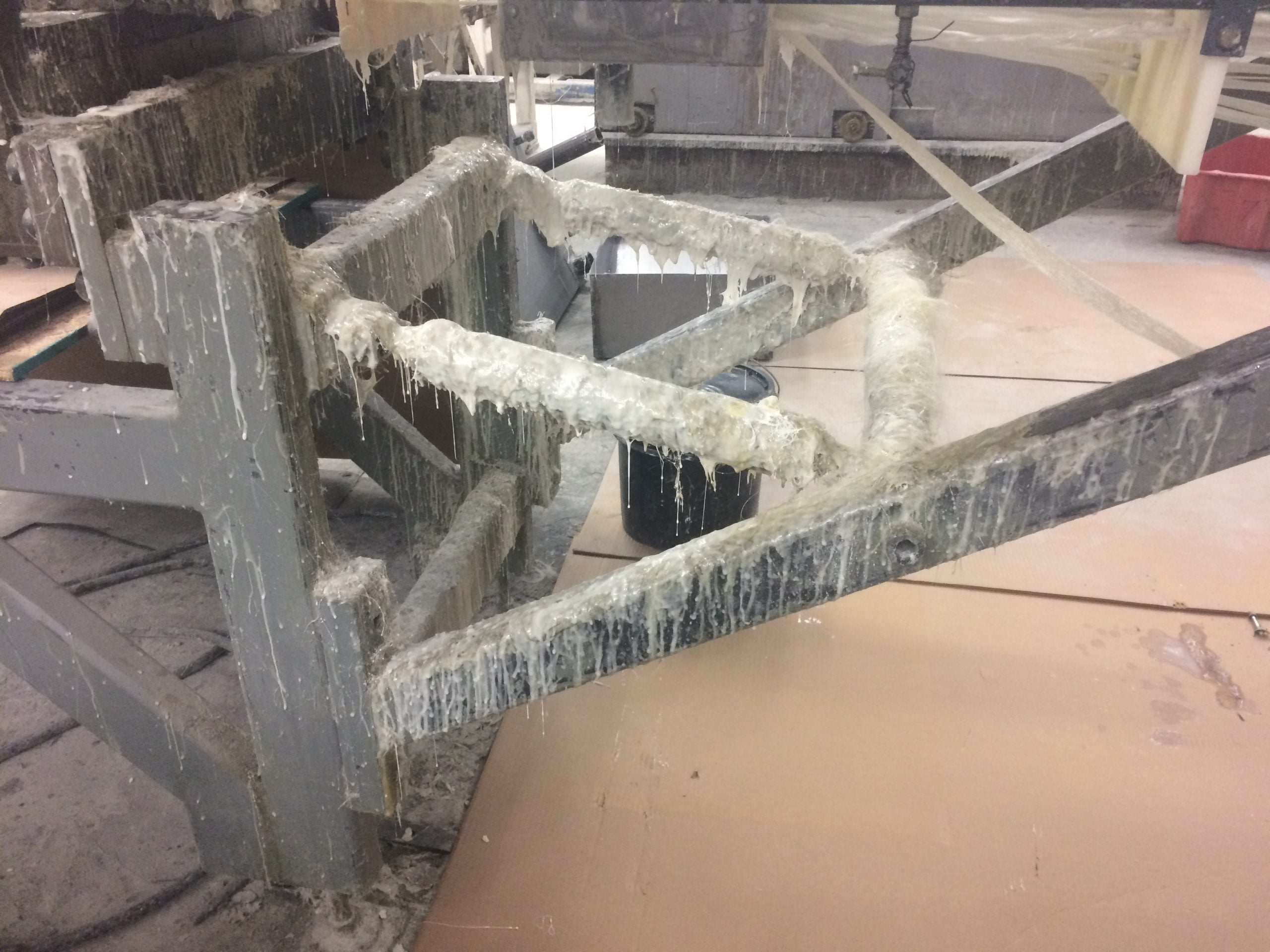 Dirty Pultrusion Pultrusion before industrial cleaning with dry ice blasting and machine restoration