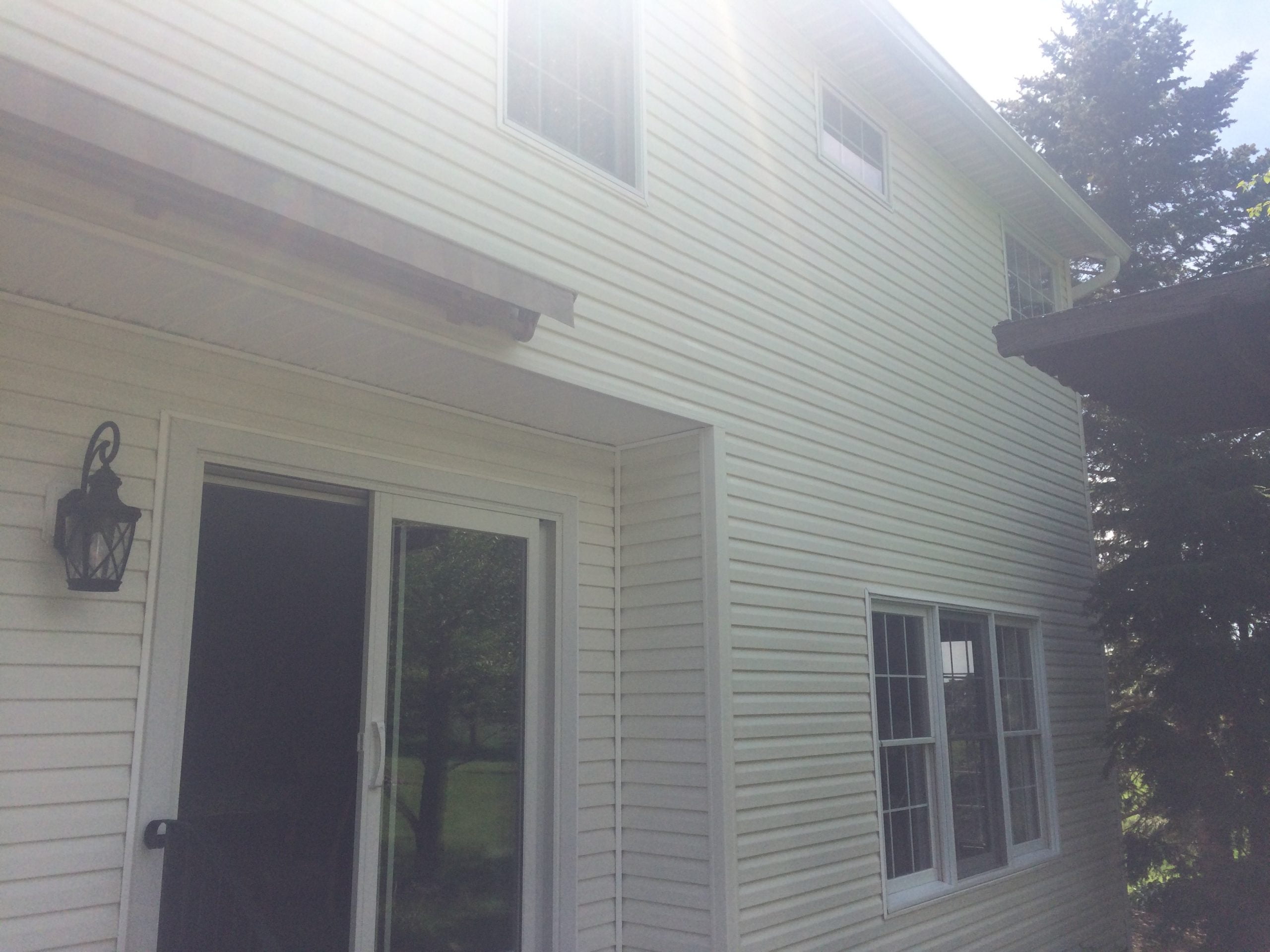 Clean Side Of House After Power Washing Cleaning And Residential Services