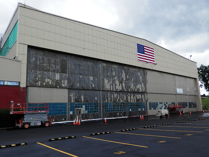a large building with a parking lot